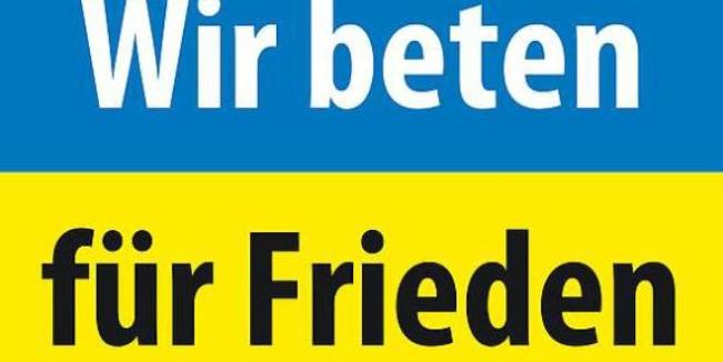 Das Logo heißt: Wir beten für Frieden